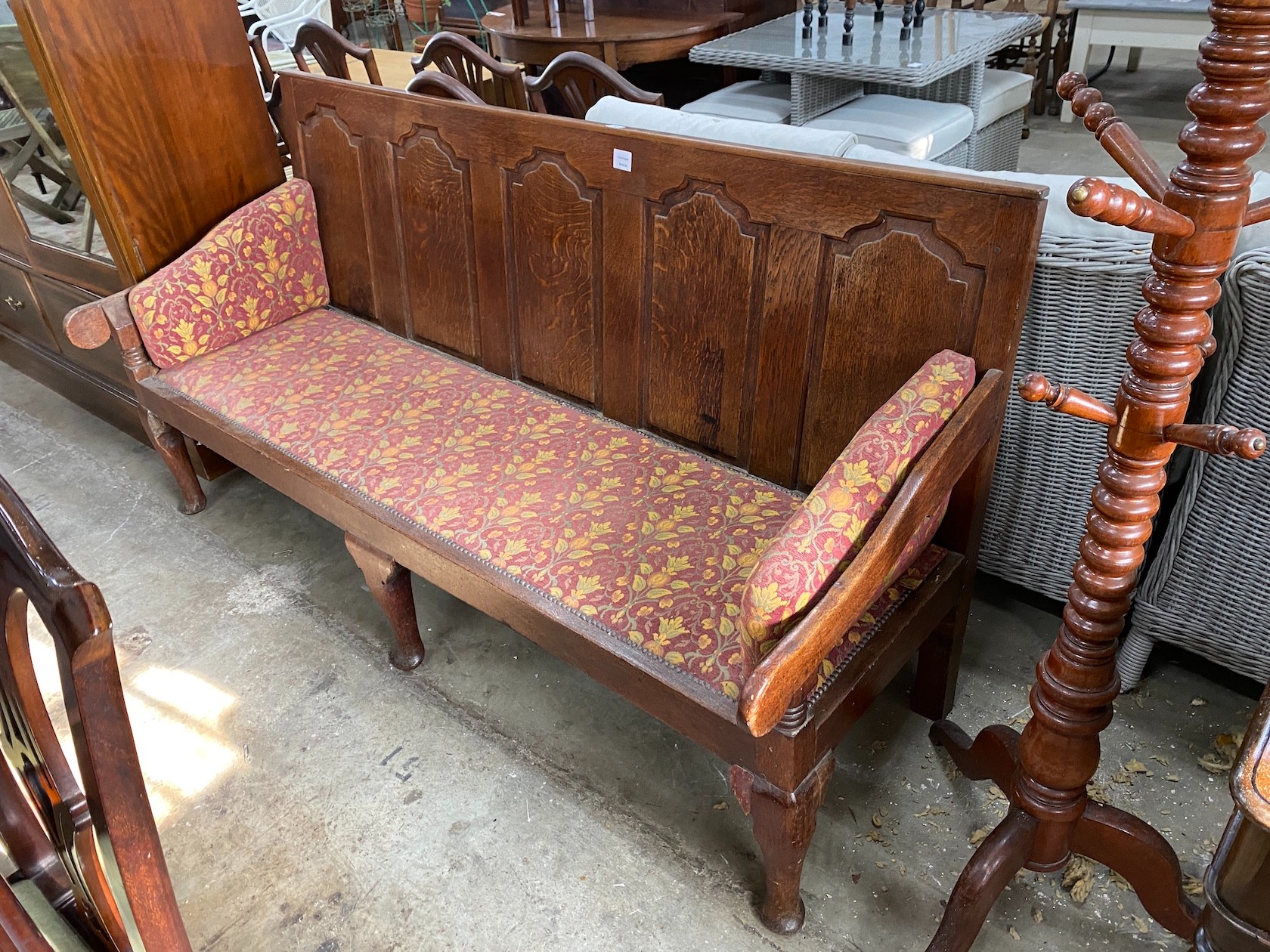 A George III oak settle, length 183cm, depth 69cm, height 93cm